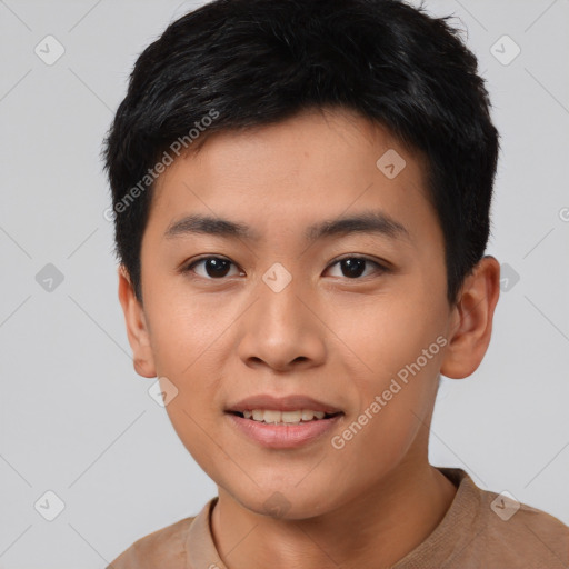 Joyful asian young-adult male with short  black hair and brown eyes