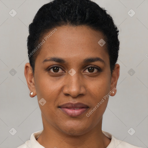 Joyful black young-adult female with short  black hair and brown eyes