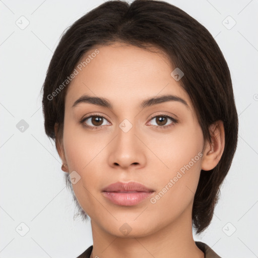 Neutral white young-adult female with medium  brown hair and brown eyes