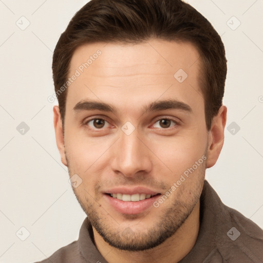 Joyful white young-adult male with short  brown hair and brown eyes