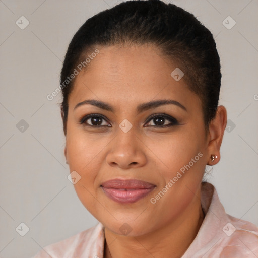 Joyful latino young-adult female with short  brown hair and brown eyes