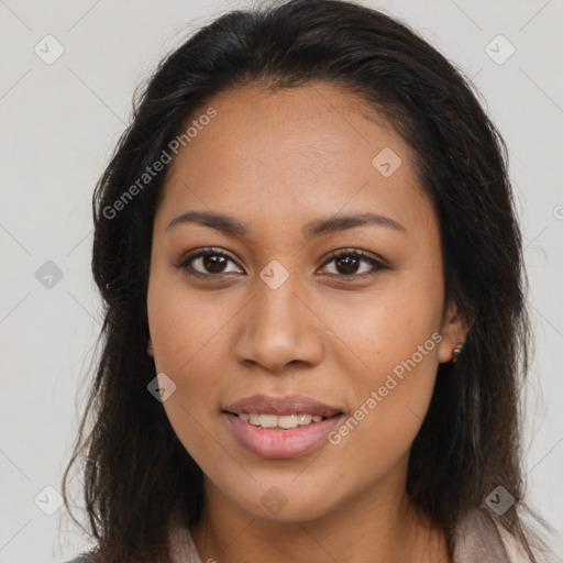 Joyful latino young-adult female with long  brown hair and brown eyes