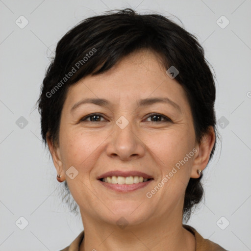 Joyful white adult female with medium  brown hair and brown eyes