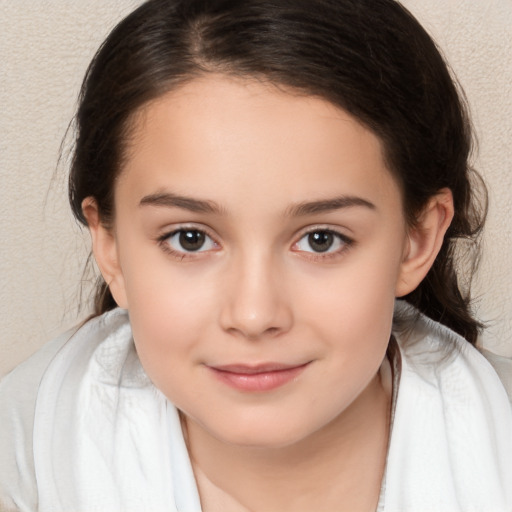 Joyful white child female with medium  brown hair and brown eyes