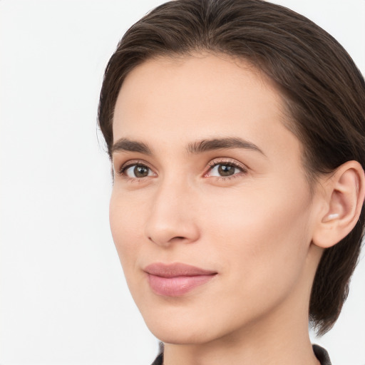 Neutral white young-adult female with medium  brown hair and brown eyes