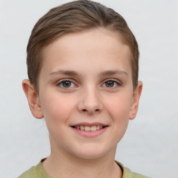 Joyful white child female with short  brown hair and brown eyes