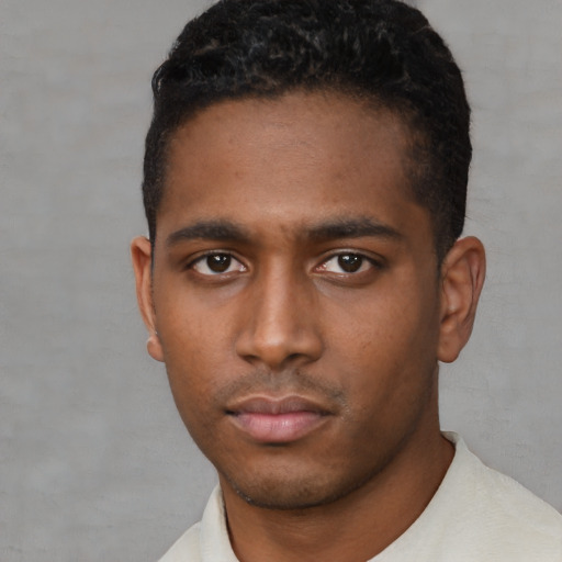Neutral black young-adult male with short  black hair and brown eyes