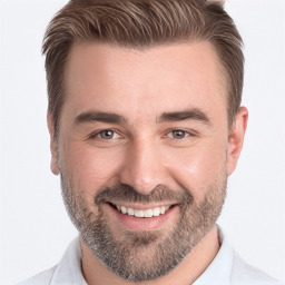 Joyful white adult male with short  brown hair and brown eyes