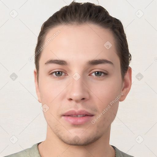 Neutral white young-adult male with short  brown hair and brown eyes