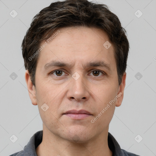 Neutral white adult male with short  brown hair and brown eyes