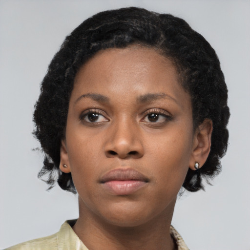 Neutral black young-adult female with short  brown hair and brown eyes