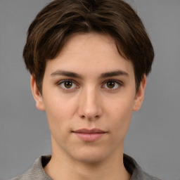 Neutral white young-adult female with short  brown hair and brown eyes