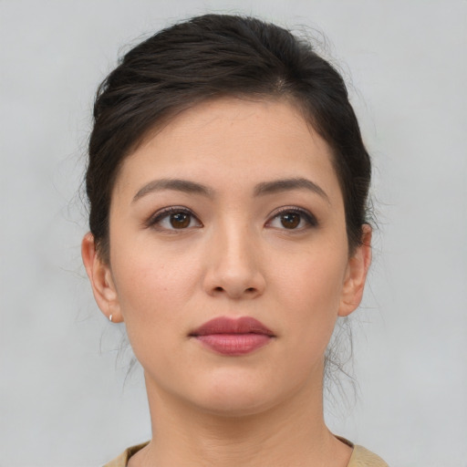 Neutral asian young-adult female with medium  brown hair and brown eyes