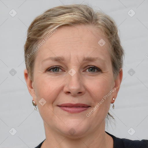 Joyful white adult female with short  brown hair and grey eyes