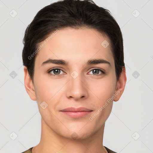 Joyful white young-adult female with short  brown hair and brown eyes