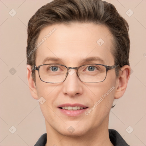 Joyful white adult male with short  brown hair and grey eyes