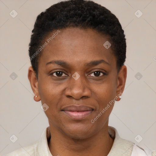 Joyful black young-adult female with short  black hair and brown eyes