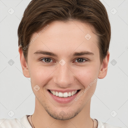 Joyful white young-adult female with short  brown hair and grey eyes