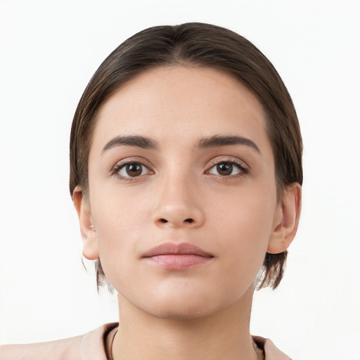 Neutral white young-adult female with short  brown hair and brown eyes