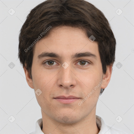 Neutral white young-adult male with short  brown hair and brown eyes