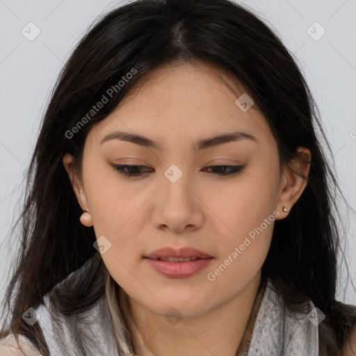 Joyful asian young-adult female with long  brown hair and brown eyes