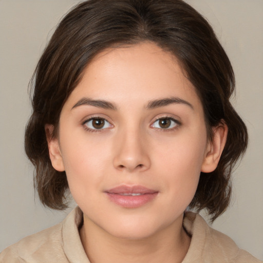 Neutral white young-adult female with medium  brown hair and brown eyes