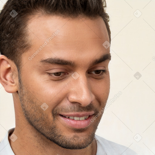 Joyful white young-adult male with short  brown hair and brown eyes