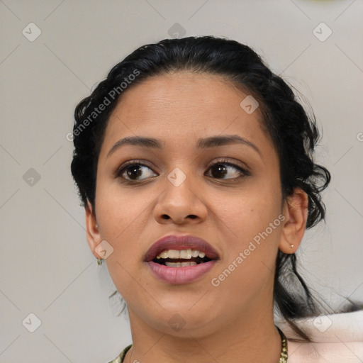 Joyful latino young-adult female with medium  black hair and brown eyes