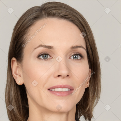 Joyful white adult female with medium  brown hair and grey eyes