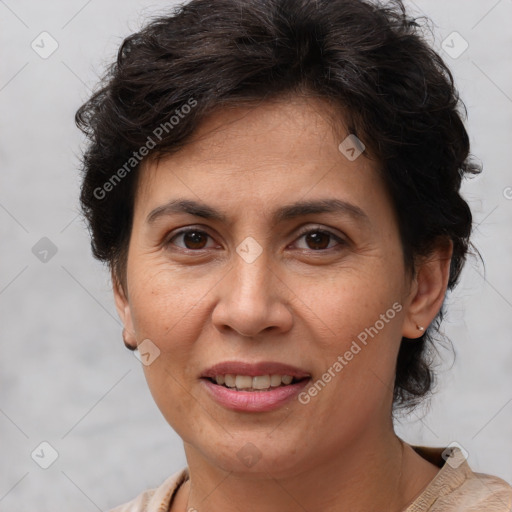 Joyful white adult female with short  brown hair and brown eyes