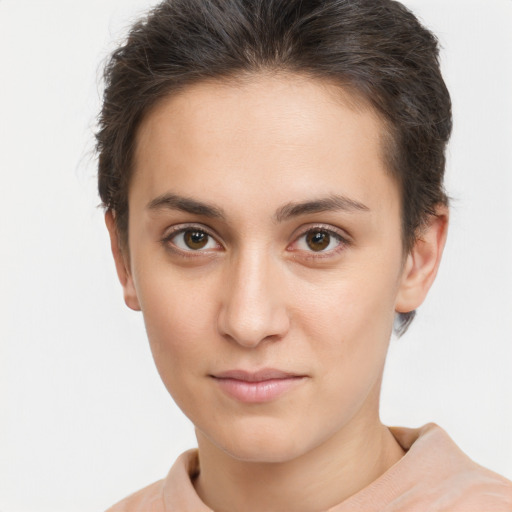 Neutral white young-adult female with short  brown hair and brown eyes