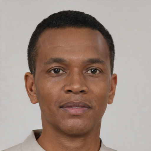 Neutral black young-adult male with short  brown hair and brown eyes