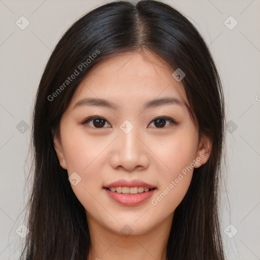 Joyful asian young-adult female with long  brown hair and brown eyes