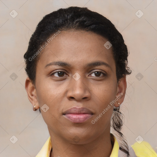 Joyful latino young-adult female with short  brown hair and brown eyes
