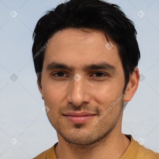 Joyful white young-adult male with short  black hair and brown eyes