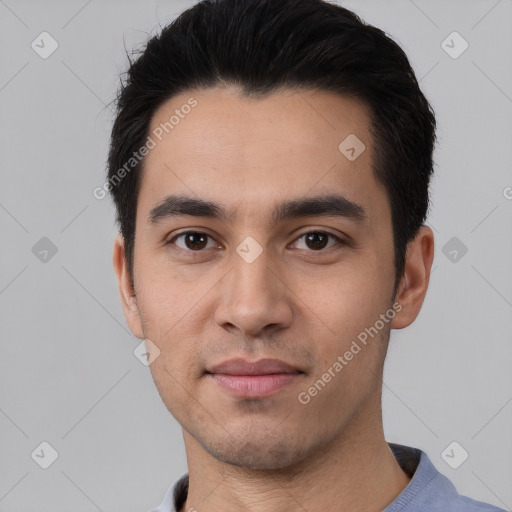 Joyful white young-adult male with short  black hair and brown eyes