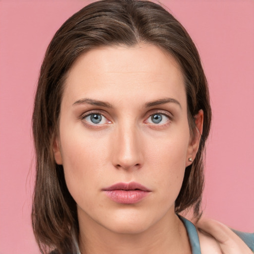 Neutral white young-adult female with medium  brown hair and blue eyes