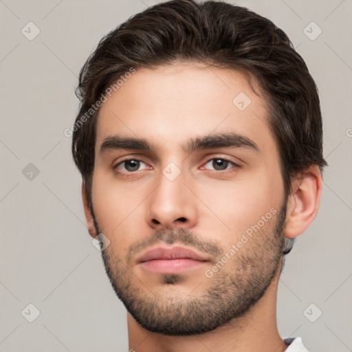 Neutral white young-adult male with short  brown hair and brown eyes