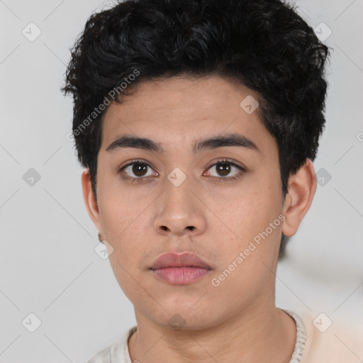 Neutral latino young-adult male with short  black hair and brown eyes