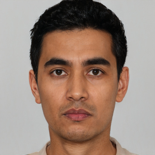 Neutral latino young-adult male with short  black hair and brown eyes