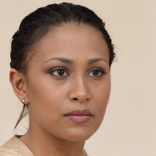 Neutral black young-adult female with short  brown hair and brown eyes