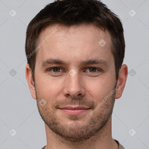 Joyful white young-adult male with short  brown hair and brown eyes