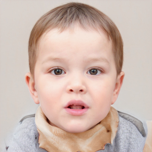 Neutral white child male with short  brown hair and blue eyes