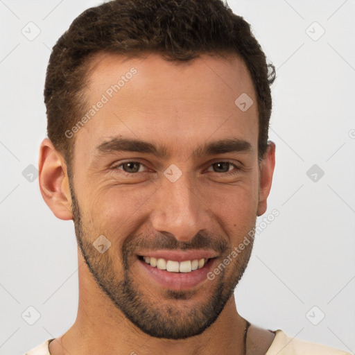 Joyful white young-adult male with short  brown hair and brown eyes