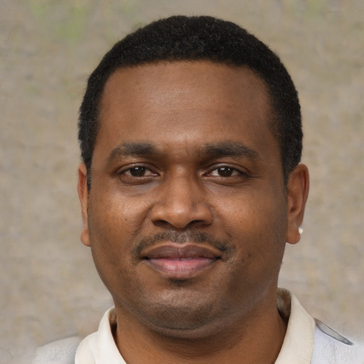 Neutral black adult male with short  black hair and brown eyes