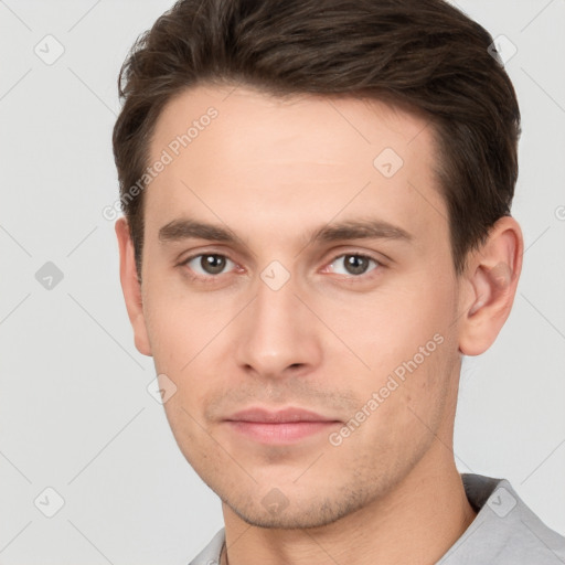 Neutral white young-adult male with short  brown hair and brown eyes