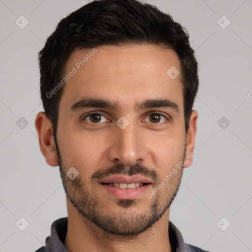 Joyful white young-adult male with short  black hair and brown eyes