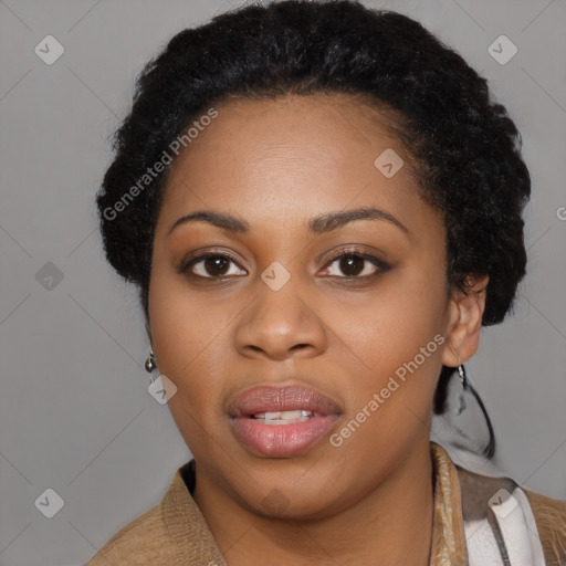 Joyful black young-adult female with short  black hair and brown eyes