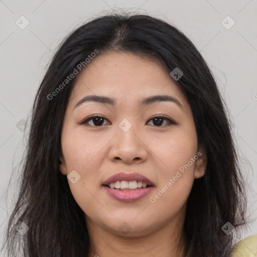 Joyful asian young-adult female with long  brown hair and brown eyes