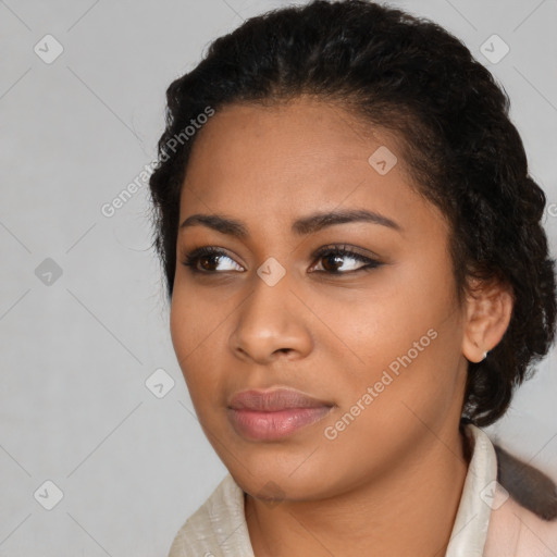 Joyful latino young-adult female with medium  black hair and brown eyes